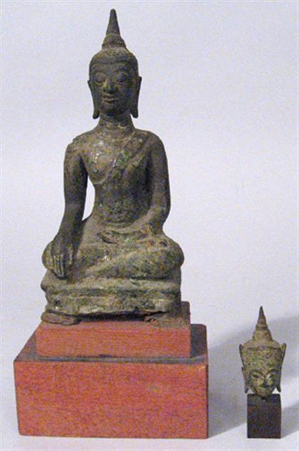 Appraisal: Thai bronze buddha and head th century The temple fragment