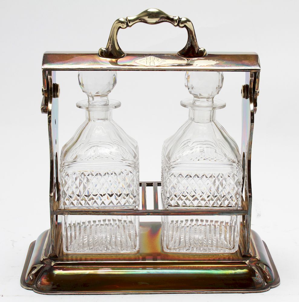 Appraisal: Silver-plate Tantalus w Two Cut-Glass Decanters Silver-plate tantalus two cut