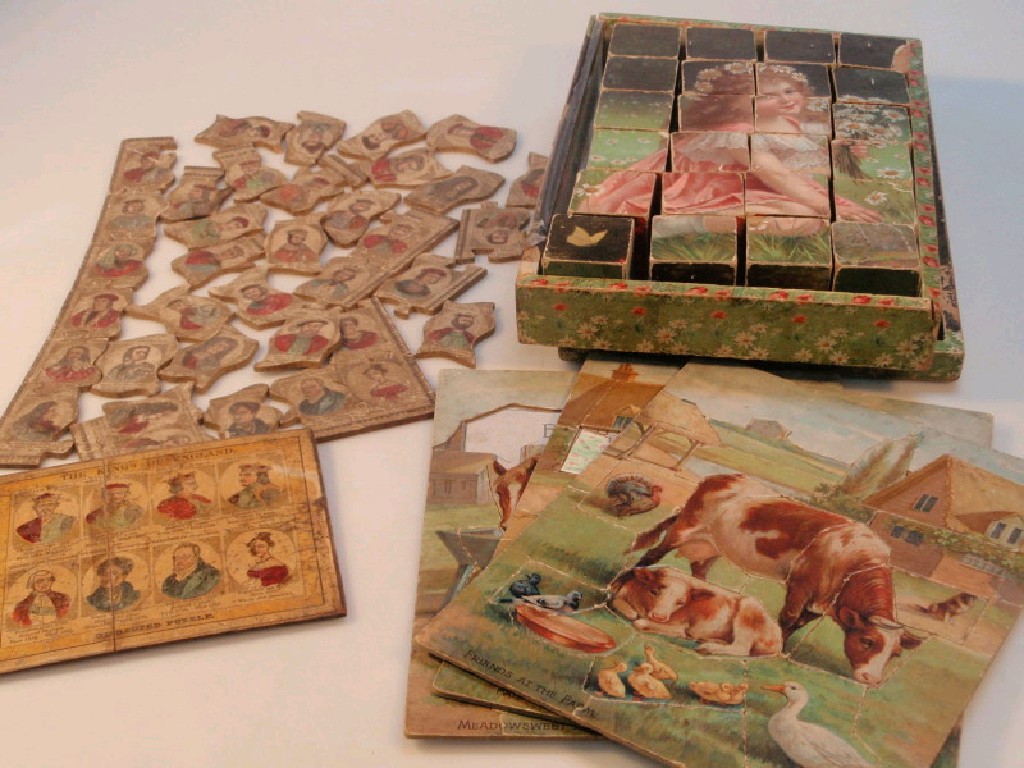 Appraisal: An early thC German set of wooden jigsaw blocks with