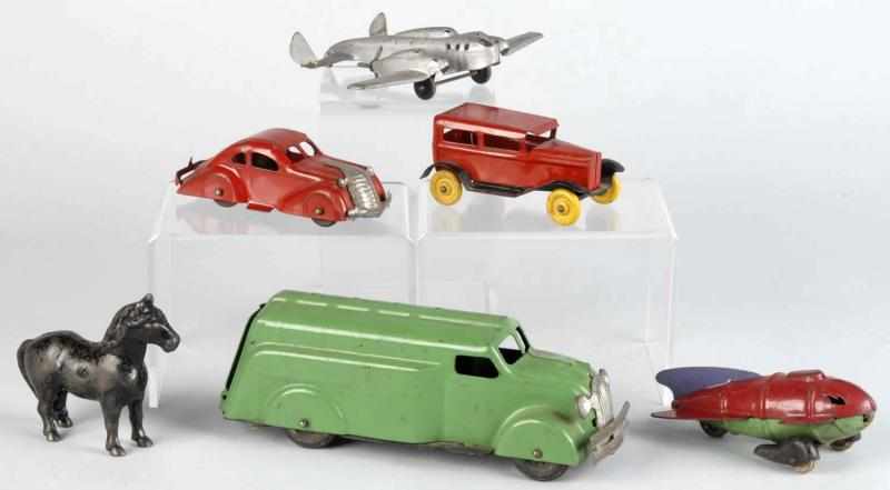 Appraisal: Lot of Pressed Steel Vehicles Still Bank Description Includes various