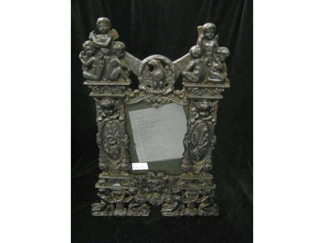 Appraisal: Victorian Metal Frame elaborate cherub decor