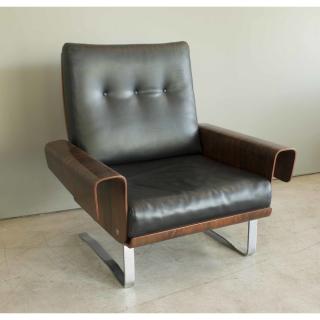 Appraisal: Modern Rosewood Chair Modern rosewood chair featuring black leather upholstered