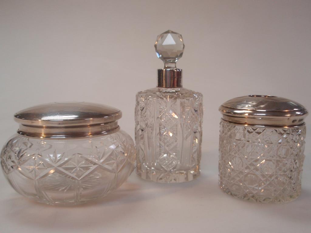 Appraisal: An Edward VII cut glass eau-de-cologne bottle with a faceted