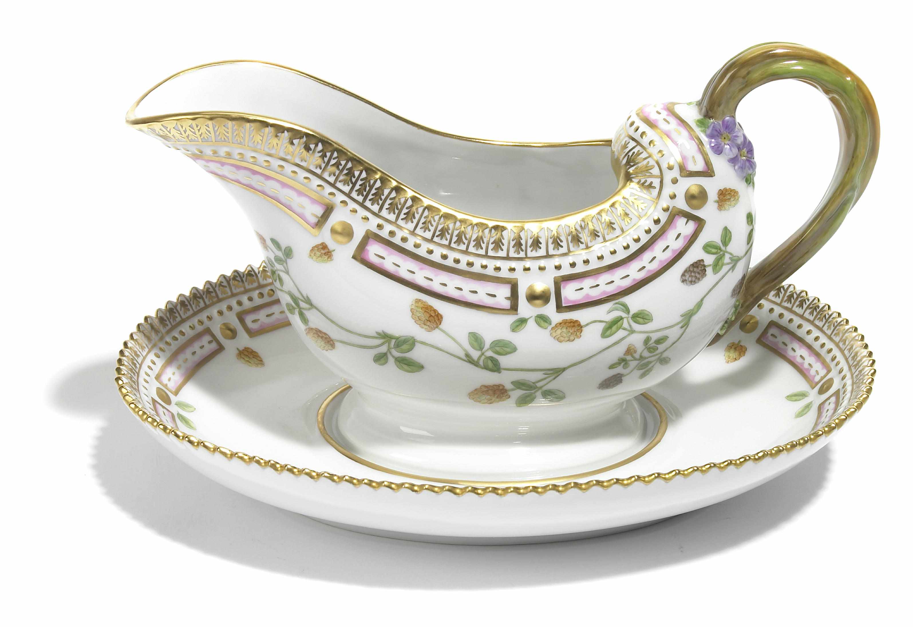 Appraisal: A Royal Copenhagen porcelain Flora Danica sauce boat with undertray