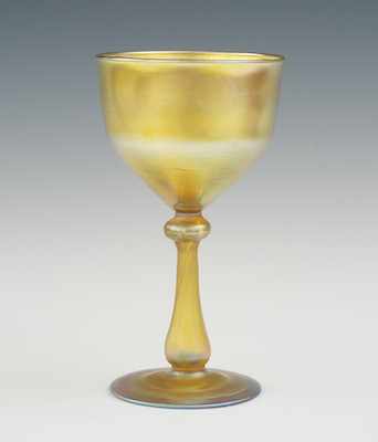 Appraisal: L C Tiffany Gold Favrile Goblet With a cylindrical bowl