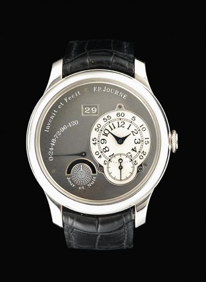 Appraisal: A platinum and ruthenian F P Lange automatic Octa Reserve