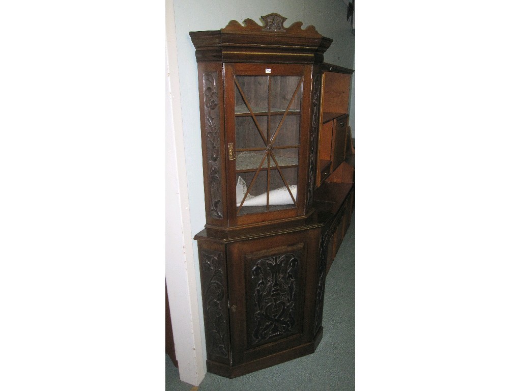 Appraisal: Glazed door corner cupboard on cabinet base