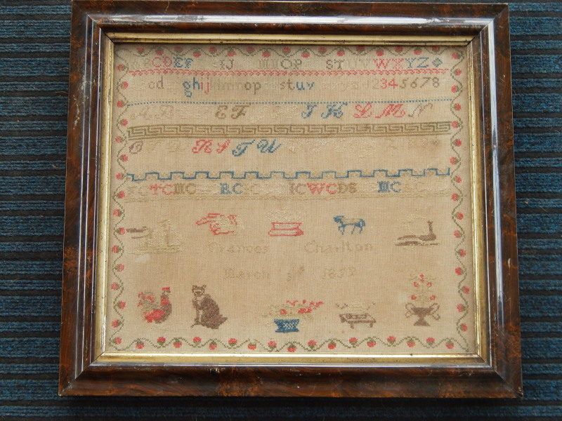 Appraisal: A mid thC wool work sampler by Frances Charlton indistinctly