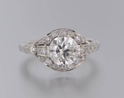 Appraisal: An Art Deco Platinum and Diamond Ring Tasteful raised platinum