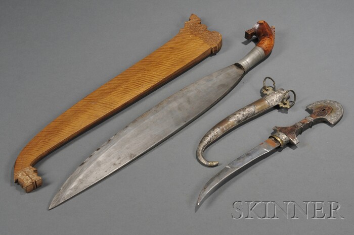 Appraisal: Two Bladed Weapons a Moroccan Jambiya or Koumaya dagger with