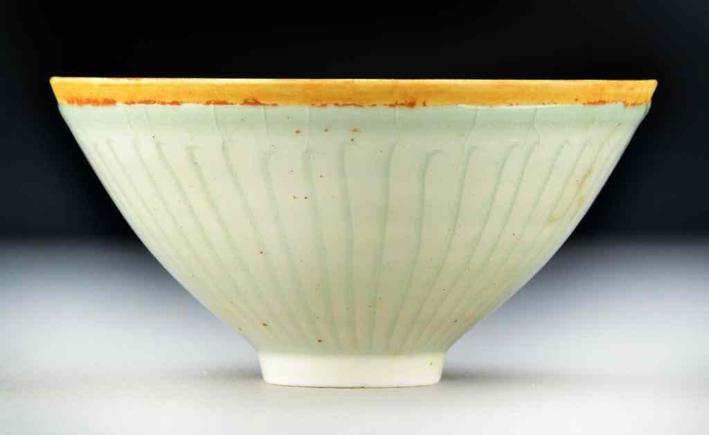 Appraisal: Chinese Celedon Porcelain BowlThe interior incised to depict sleeping boys