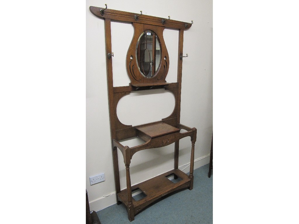 Appraisal: An Art Nouveau oak hallstand decorated with stylised flowerheads cm