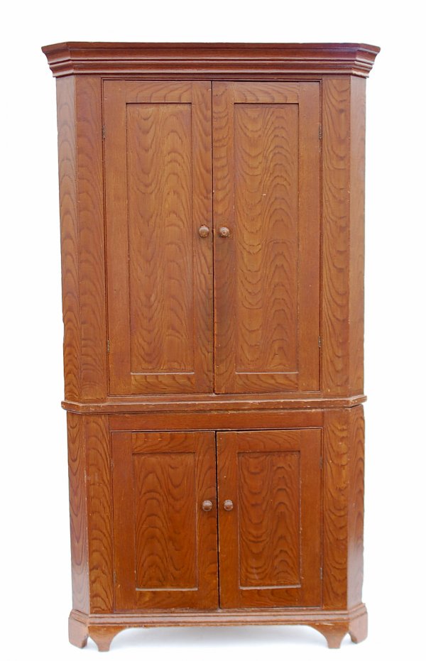 Appraisal: Corner cupboard Two part Two over two blind paneled doors