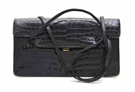 Appraisal: A Judith Leiber Black Crocodile Bag gold hardware and jet