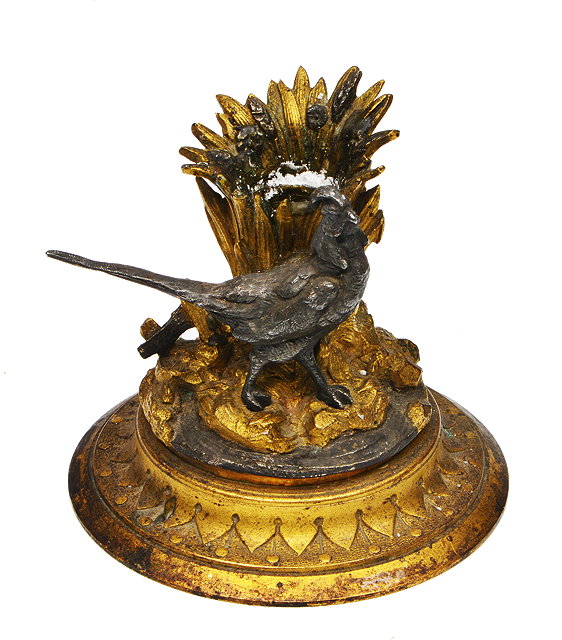 Appraisal: A TH CENTURY GILT METAL CANDLE HOLDER naturalistically modelled with