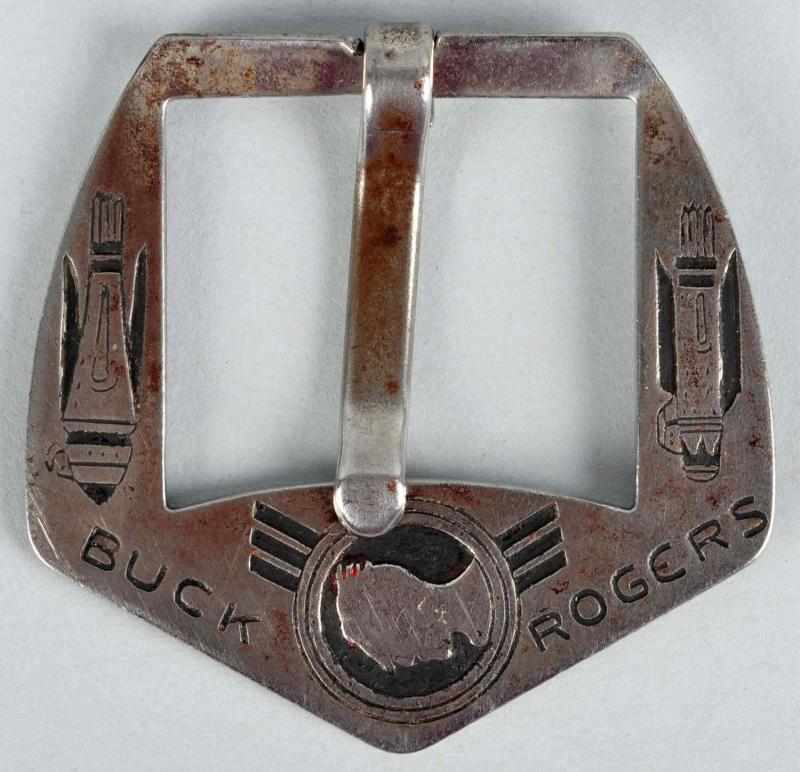 Appraisal: Vintage Buck Rogers Silver Belt Buckle Description Made by the