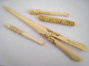 Appraisal: Two Chinese carved ivory cheroot holders a similar needle case