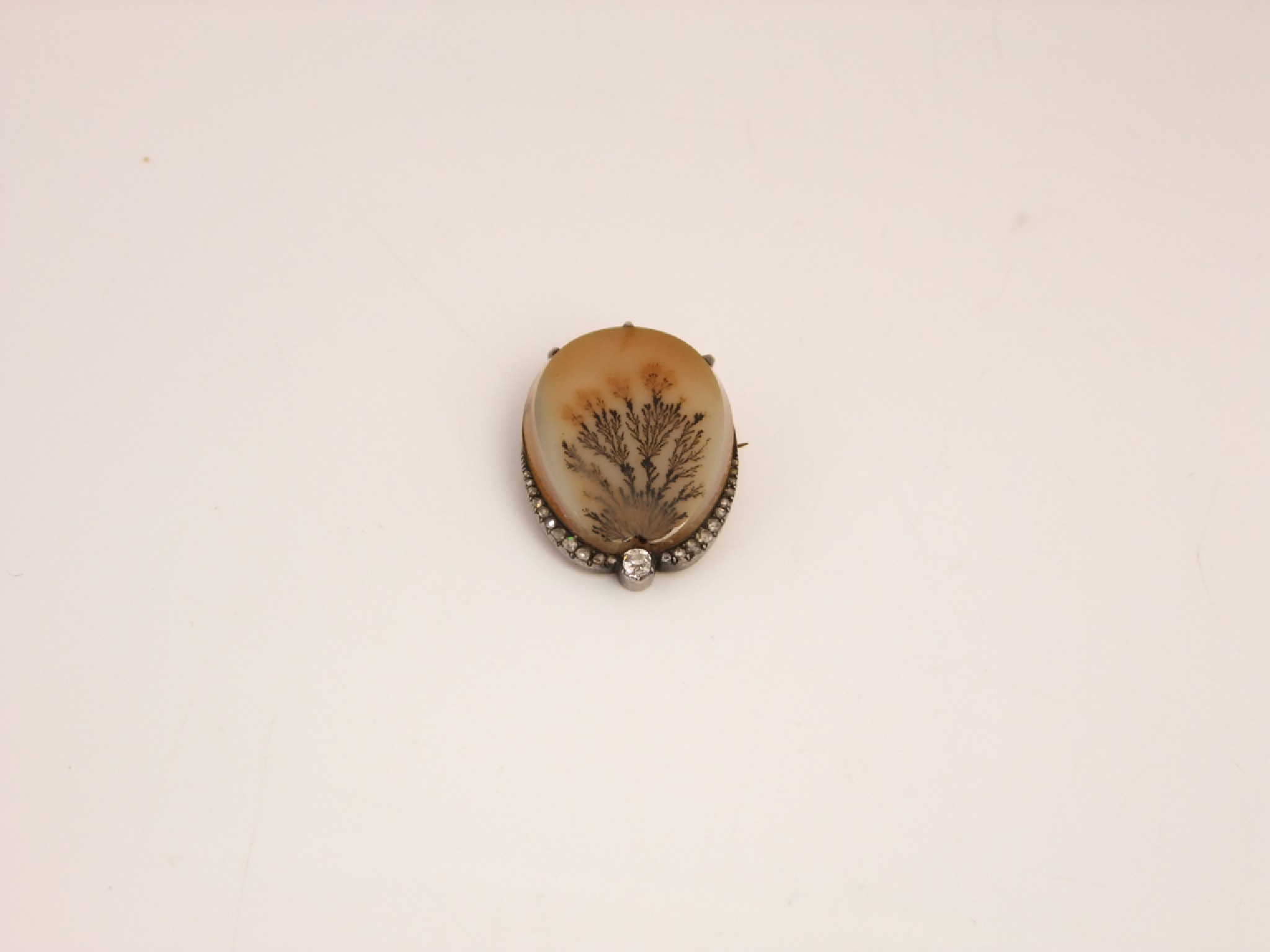 Appraisal: A th century brooch the central moss agate highlighted with