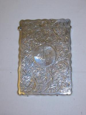 Appraisal: A VICTORIAN CARD CASE of shaped oblong form with hinged