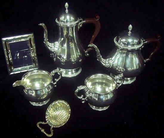 Appraisal: A four-piece service comprising coffee pot teapot cream jug and