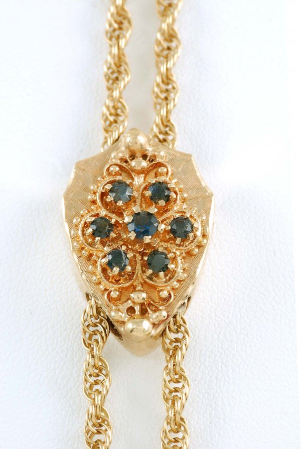 Appraisal: Stamped K yellow gold lariat necklace with sapphire set slide