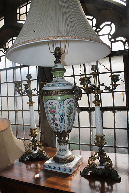 Appraisal: A FRENCH STYLE TABLE LAMP of urn form with ram's