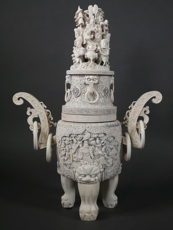 Appraisal: LARGE CHINESE CARVED IVORY TRIPOD CENSERCylindrical form carved in intricate