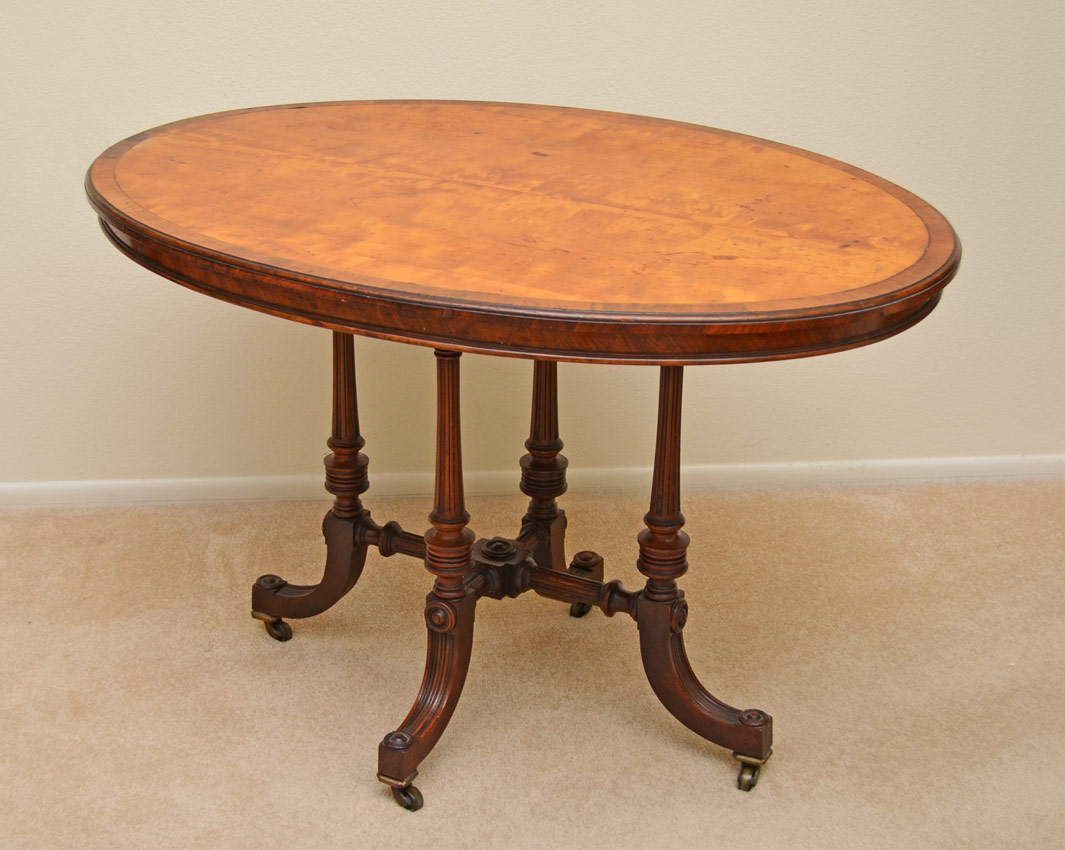 Appraisal: VICTORIAN OVAL PARLOR TABLE Oval wood top with string inlay