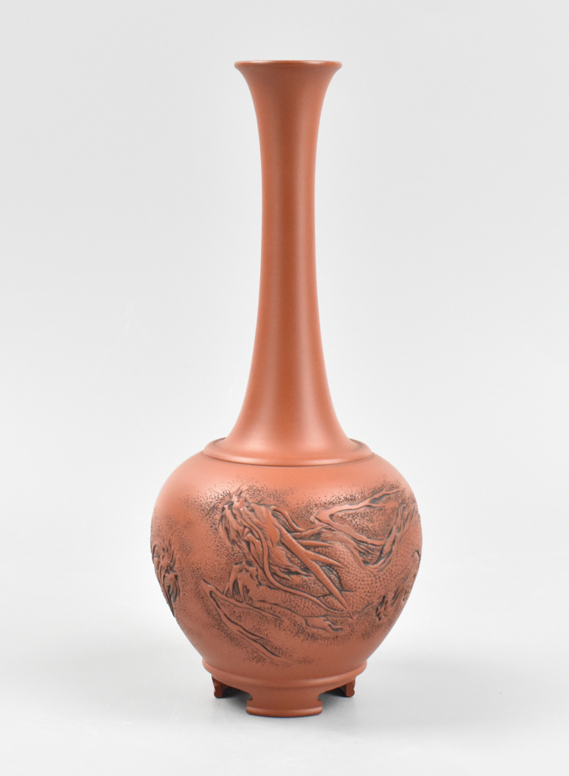 Appraisal: A Chinese zisha vase with raised dragon dating from the