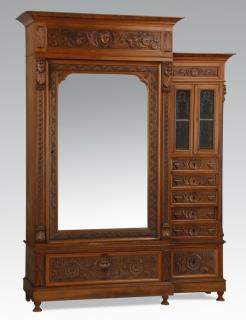 Appraisal: th c carved walnut wardrobe Late th century Continental asymmetrical