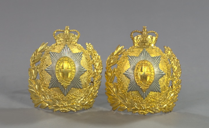 Appraisal: Pair of British Reproduction Guards Regiment Helmet Plates of gilded