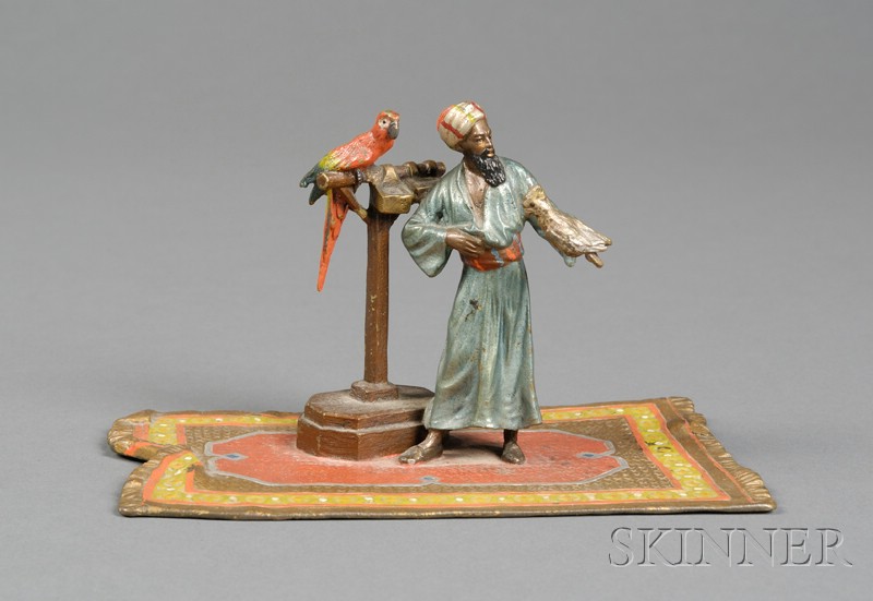 Appraisal: Small Austrian Cold Painted Bronze Figure of a Bird Seller