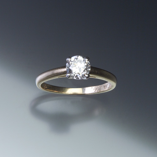 Appraisal: DIAMOND Solitaire ring in k yellow gold and platinum A