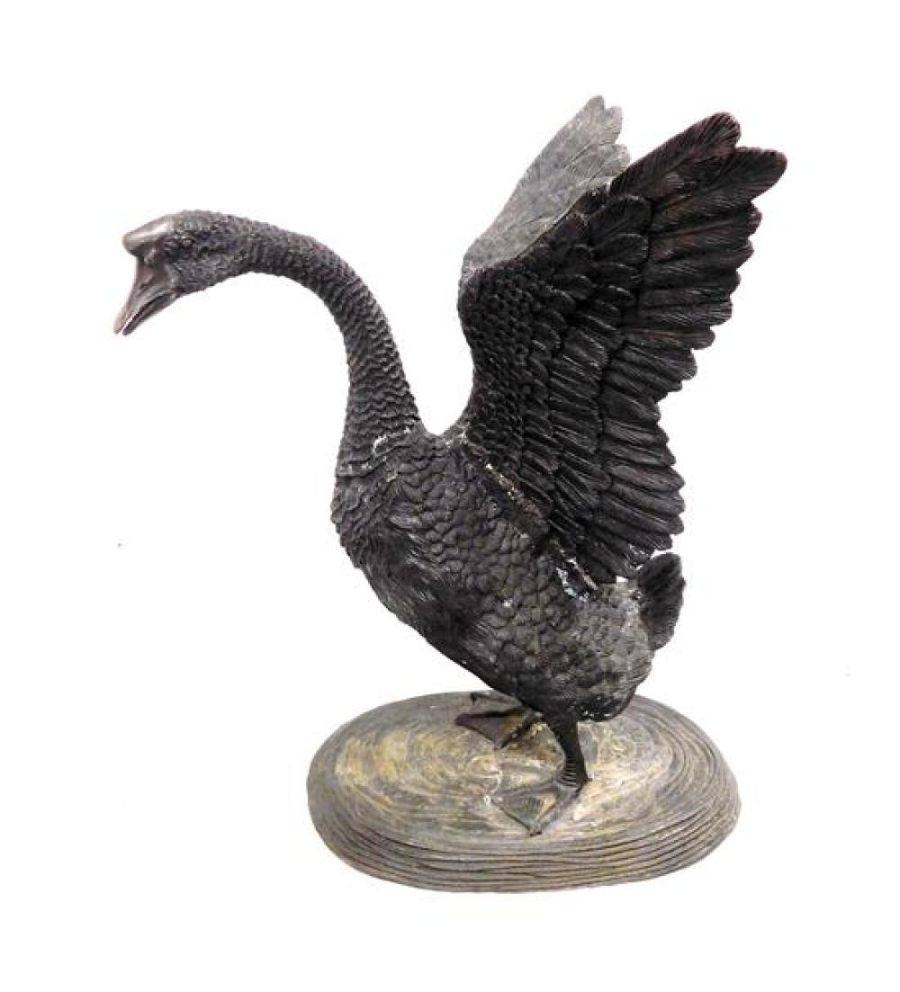 Appraisal: GARDEN Cast metal swan th C standing form with upswept