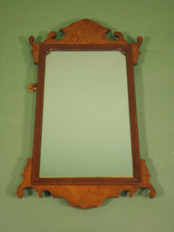 Appraisal: A burr walnut fret frame wall mirror in George II