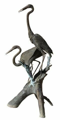 Appraisal: Patinated bronze bird sculpture depicting two herons on naturalistic base