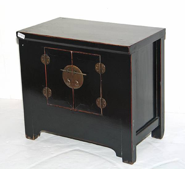 Appraisal: A pair of black lacquered wood two-door small chests with