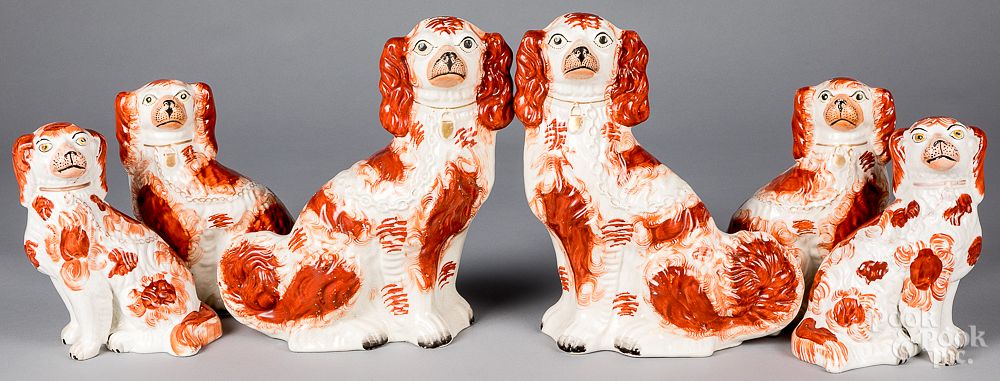 Appraisal: Three pairs of Staffordshire spaniels Three pairs of Staffordshire spaniels