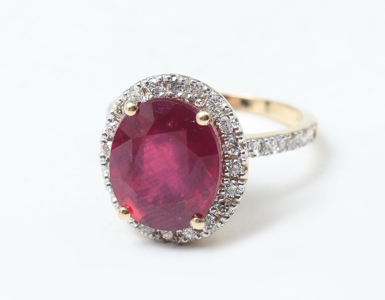 Appraisal: K CT RUBY DIAMOND RING The featured CT oval mixed