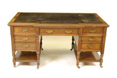 Appraisal: A late Victorian walnut twin pedestal desk by Maple Co