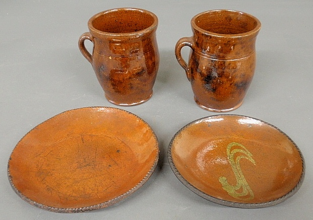 Appraisal: - Two redware bean pots th c each approx h