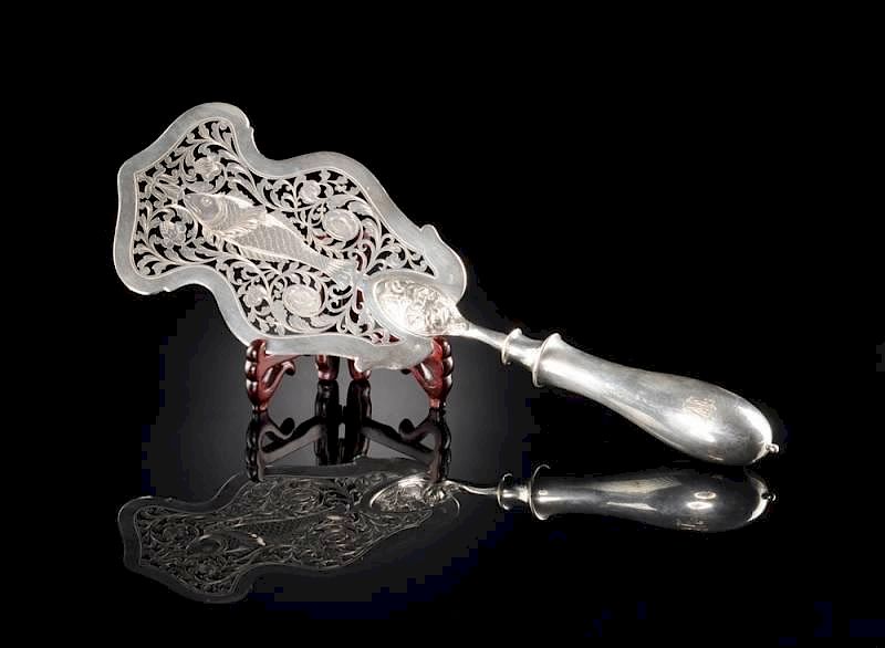 Appraisal: AN AUSTRO-HUNGARIAN STANDARD SILVER RETICULATED FISH SERVER CIRCA - AN