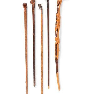 Appraisal: Five Carved and Mixed Metal Figural Canes and Walking Sticks