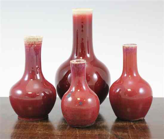 Appraisal: Three Chinese flambe glazed small bottle vases and a similar