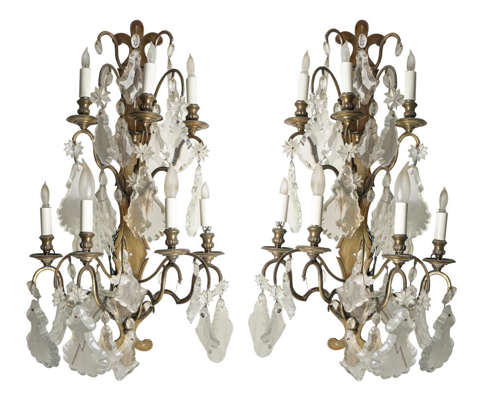 Appraisal: PAIR OF CRYSTAL SEVEN-LIGHT WALL SCONCESgilt-metal frames Condition with missing