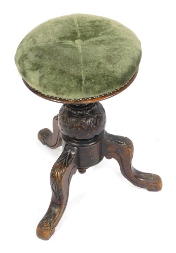 Appraisal: A Victorian rise and fall piano stool with green materiel