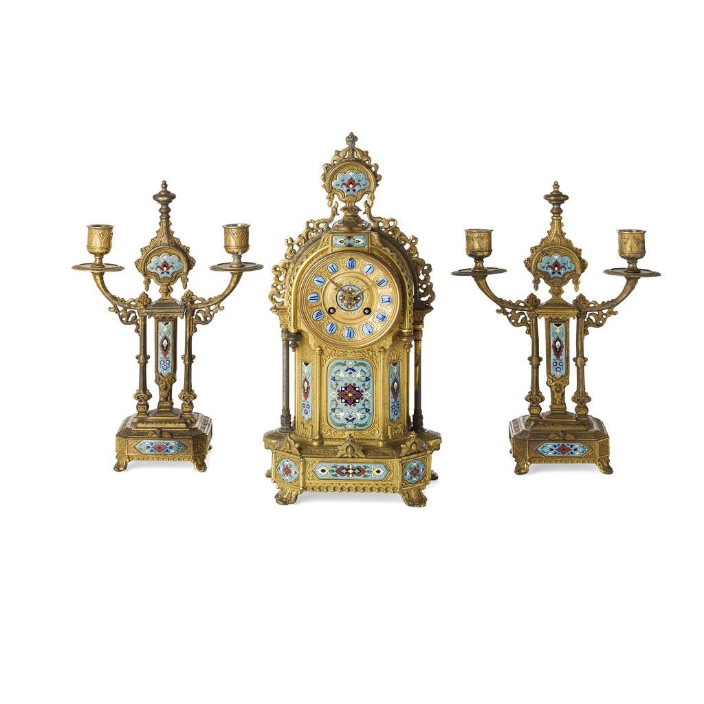 Appraisal: FRENCH GILT METAL AND ENAMEL THREE-PIECE CLOCK GARNITURE TH CENTURY