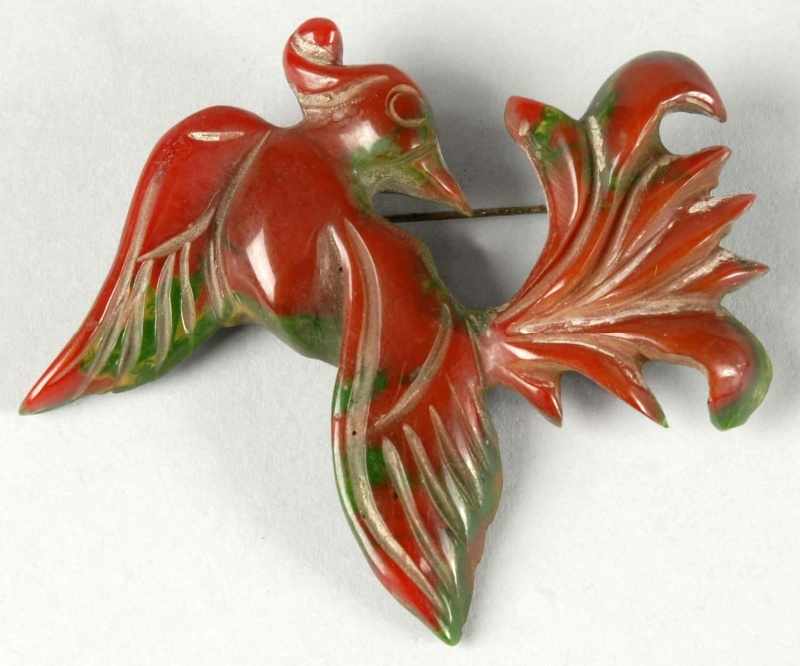 Appraisal: Bakelite Phoenix Bird Pin Description Green and brown Highly detailed