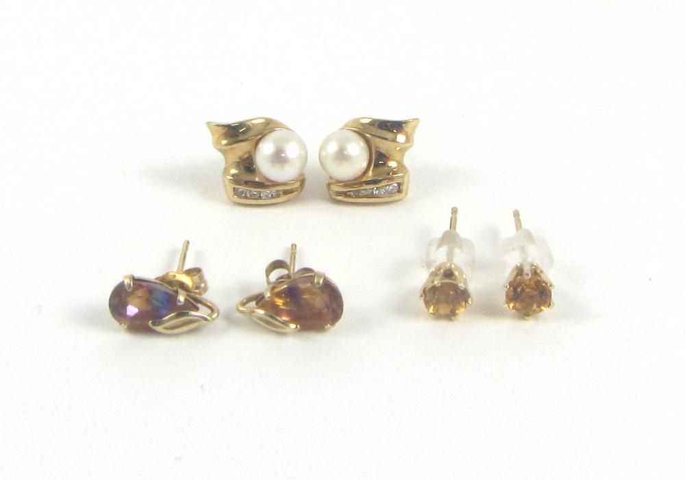 Appraisal: THREE PAIRS OF FOURTEEN KARAT GOLD EAR STUDS including a