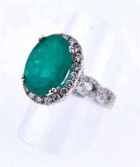 Appraisal: Colombian emerald and diamond ring ct oval-cut emerald and one